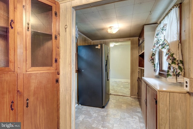 6109 Oakland Mills Rd, Sykesville, MD 21784 - bathroom featuring stone finish floors and wood walls