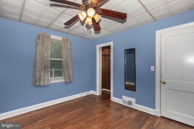 6109 Oakland Mills Rd, Sykesville, MD 21784 - unfurnished bedroom with baseboards, wood finished floors, and a ceiling fan