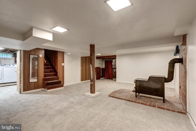 6109 Oakland Mills Rd, Sykesville, MD 21784 - finished below grade area with carpet, stairway, washer and clothes dryer, wooden walls, and baseboards