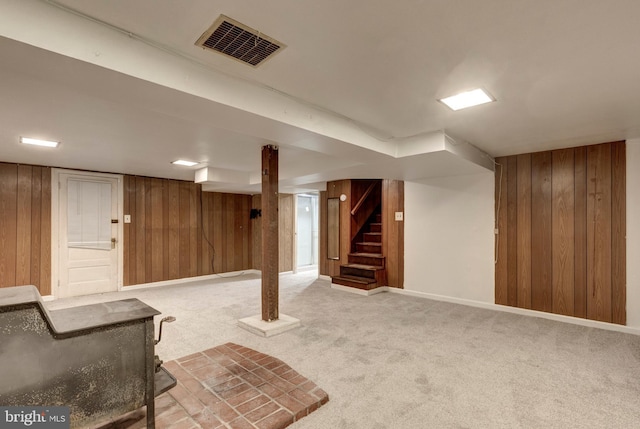 6109 Oakland Mills Rd, Sykesville, MD 21784 - finished below grade area featuring wooden walls, stairway, light carpet, and baseboards