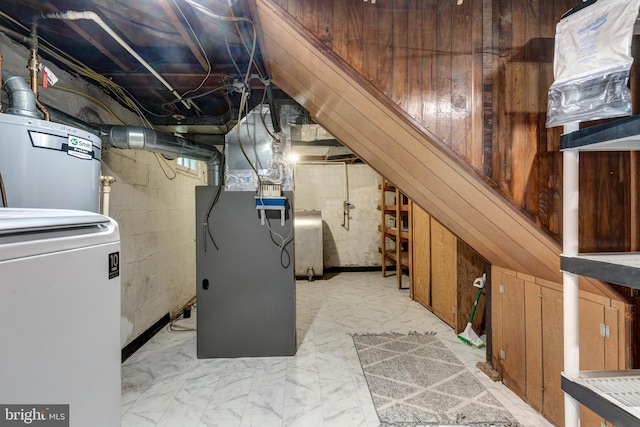 6109 Oakland Mills Rd, Sykesville, MD 21784 - unfinished basement with washer / dryer, heating unit, gas water heater, oil tank, and marble look tile flooring