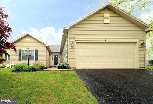 2408 Setter Run Ln, State College, PA 16801 - view of front of home with asphalt driveway, a front lawn, and an attached garage