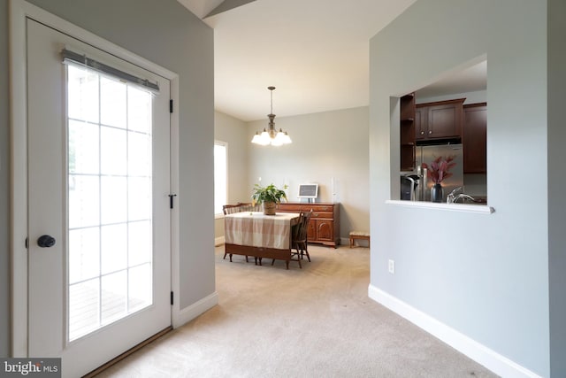 2408 Setter Run Ln, State College, PA 16801 - entryway featuring a chandelier, light carpet, and baseboards