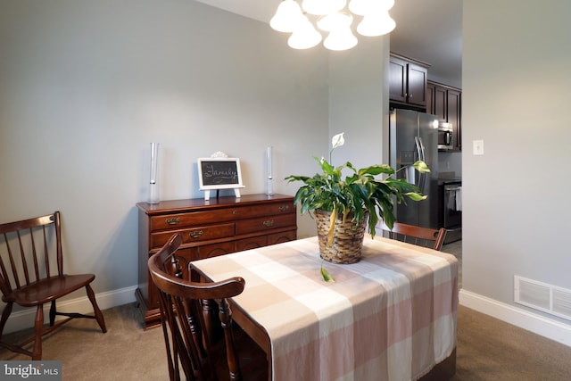 2408 Setter Run Ln, State College, PA 16801 - dining room featuring a chandelier, light carpet, and baseboards