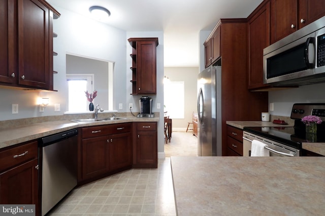 2408 Setter Run Ln, State College, PA 16801 - kitchen with appliances with stainless steel finishes, open shelves, a sink, and light countertops