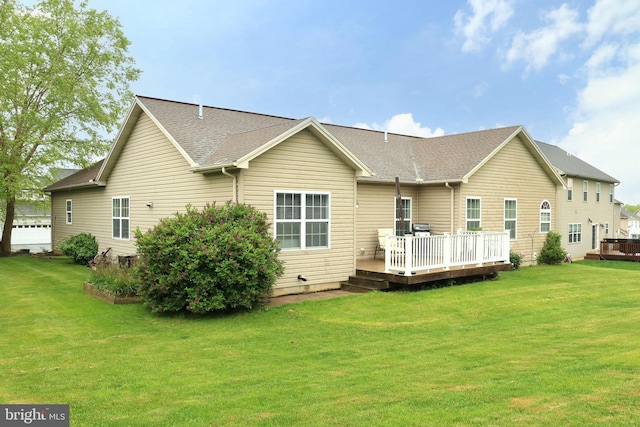 2408 Setter Run Ln, State College, PA 16801 - back of house featuring a deck, a yard, and roof with shingles