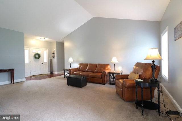 2408 Setter Run Ln, State College, PA 16801 - living room featuring vaulted ceiling, carpet, baseboards, and plenty of natural light