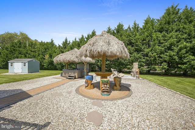 8550 Sophies Way, Lincoln, DE 19960 - view of patio / terrace with a hot tub, an outbuilding, and a storage unit