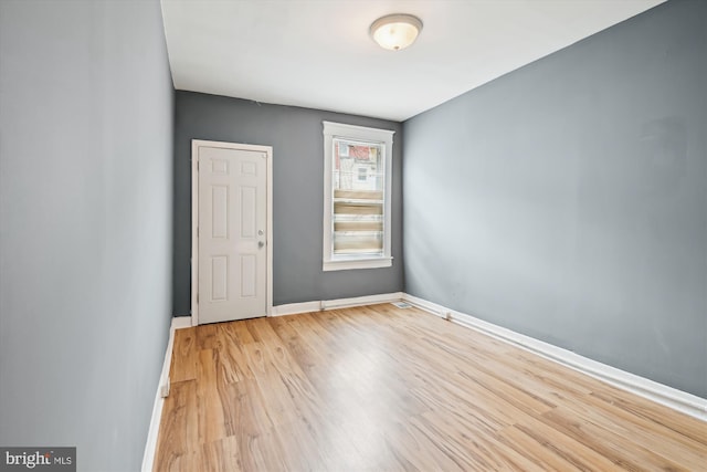 1081 Ellicott Dr, Baltimore, MD 21216 - spare room with wood finished floors and baseboards