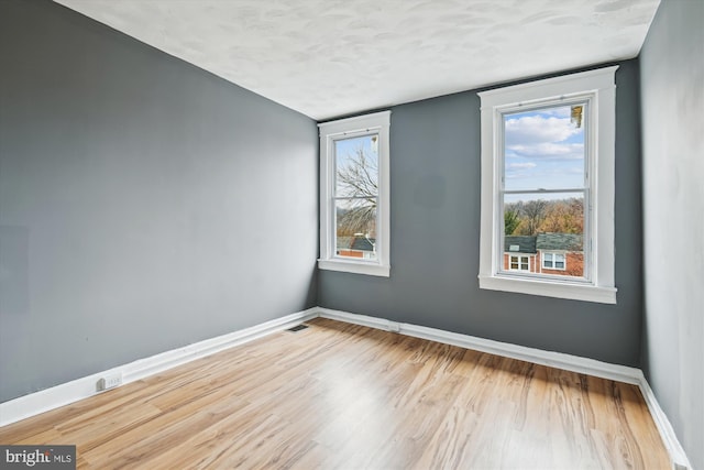 1081 Ellicott Dr, Baltimore, MD 21216 - spare room with wood finished floors and baseboards