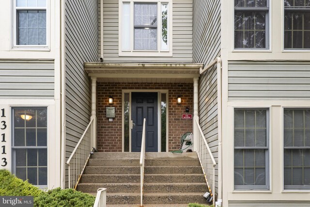 13113 Briarcliff Ter Unit 1-101, Germantown, MD 20874 - doorway to property with brick siding