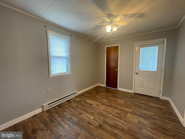 604 Winifred Rd, Cumberland, MD 21502 - foyer entrance with a baseboard heating unit, ornamental molding, dark wood finished floors, ceiling fan, and baseboards