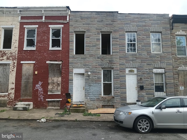 multi unit property with stone siding