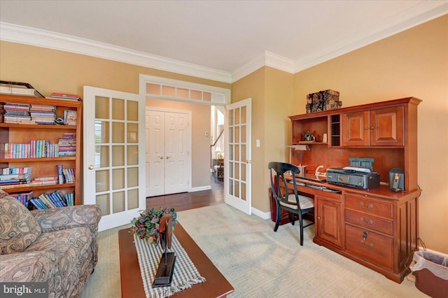 office with french doors, baseboards, carpet, and ornamental molding