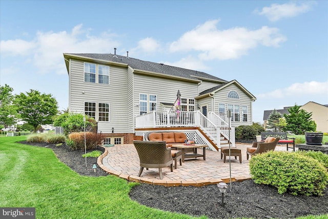 back of house featuring an outdoor hangout area, a patio, a wooden deck, stairs, and a lawn