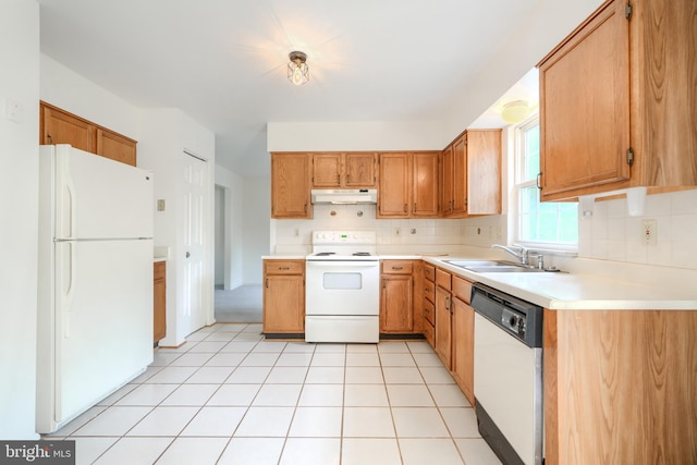 4001 Cedar Mills Rd, Randallstown, MD 21133 - kitchen featuring white appliances, a sink, under cabinet range hood, tasteful backsplash, and light countertops