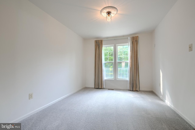 4001 Cedar Mills Rd, Randallstown, MD 21133 - empty room featuring carpet and baseboards