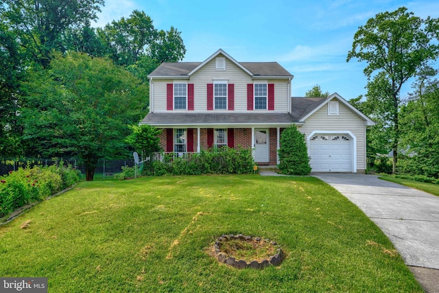 4001 Cedar Mills Rd, Randallstown, MD 21133 - view of front of home featuring an attached garage, driveway, a front yard, and a porch