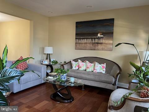 living room with wood finished floors
