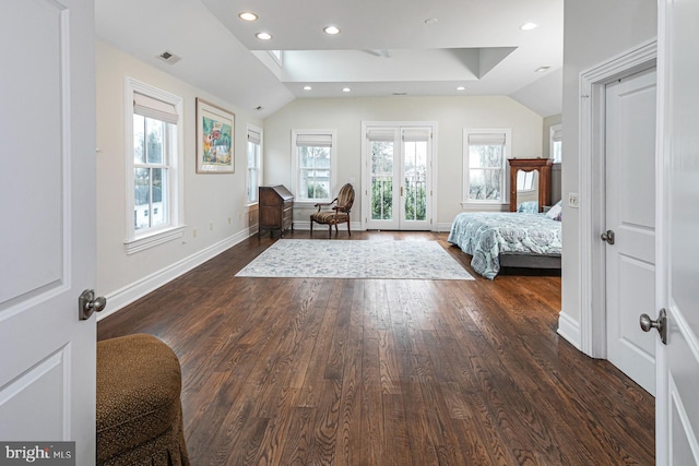bedroom featuring dark wood-style floors, recessed lighting, lofted ceiling, baseboards, and access to exterior