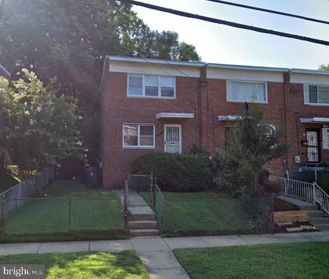 5817 Jamestown Rd, Hyattsville, MD 20782 - view of property with brick siding and a gate