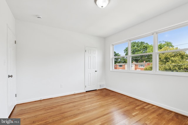 5817 Jamestown Rd, Hyattsville, MD 20782 - spare room with baseboards and light wood-style floors