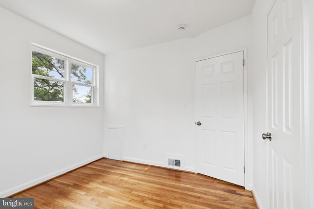 5817 Jamestown Rd, Hyattsville, MD 20782 - spare room with light wood-type flooring and baseboards