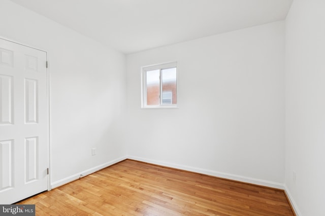 5817 Jamestown Rd, Hyattsville, MD 20782 - empty room featuring light wood finished floors and baseboards