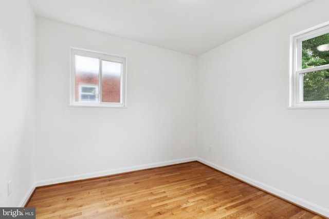 5817 Jamestown Rd, Hyattsville, MD 20782 - unfurnished room with light wood-type flooring and baseboards