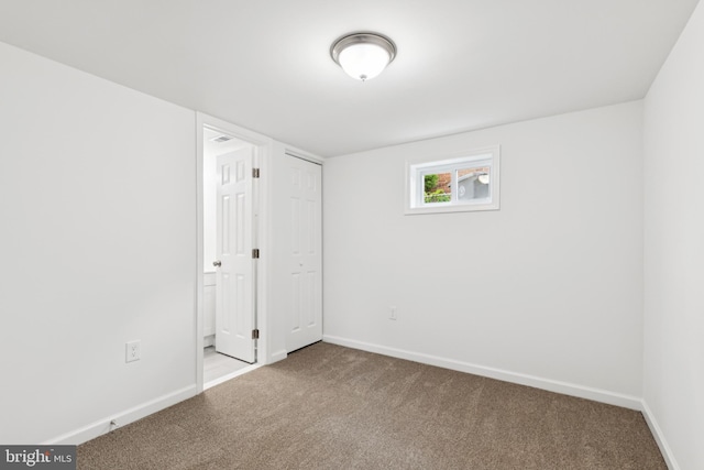 5817 Jamestown Rd, Hyattsville, MD 20782 - carpeted empty room featuring baseboards