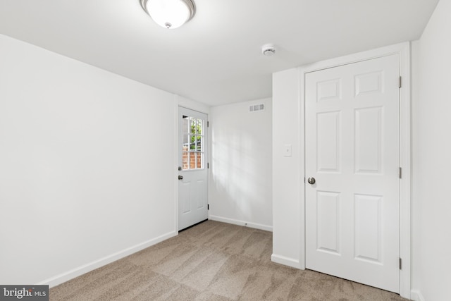 5817 Jamestown Rd, Hyattsville, MD 20782 - unfurnished bedroom with carpet floors and baseboards