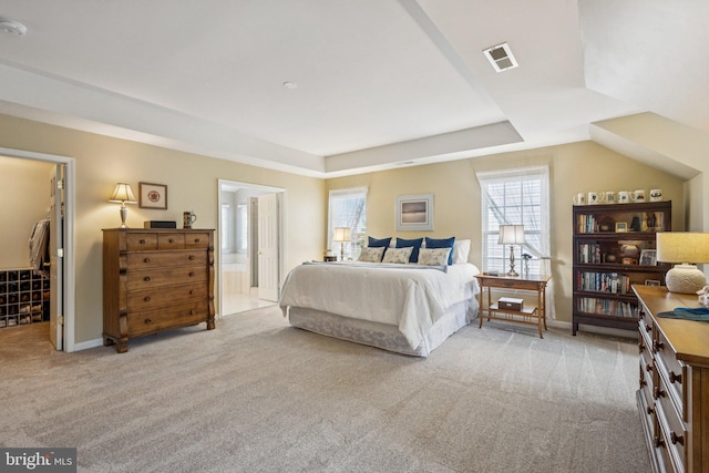12649 Victory Lakes Loop, Bristow, VA 20136 - carpeted bedroom with a raised ceiling and ensuite bath