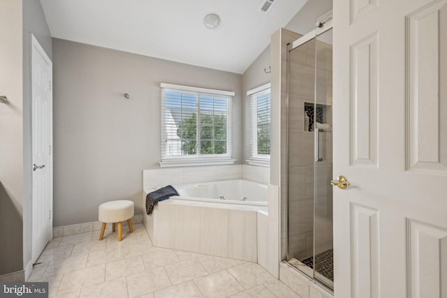 12649 Victory Lakes Loop, Bristow, VA 20136 - full bath featuring a tub with jets, a shower stall, and vaulted ceiling
