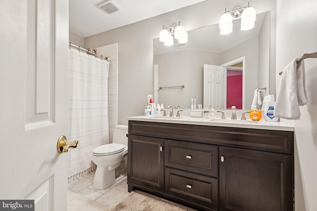 12649 Victory Lakes Loop, Bristow, VA 20136 - full bath with double vanity, tile patterned floors, and a shower with curtain
