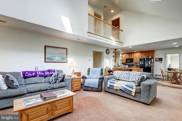 137 S Ronks Rd, Ronks, PA 17572 - living area with high vaulted ceiling, recessed lighting, and light colored carpet