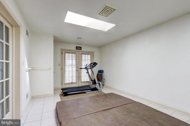 137 S Ronks Rd, Ronks, PA 17572 - exercise room featuring french doors, tile patterned floors, and a skylight