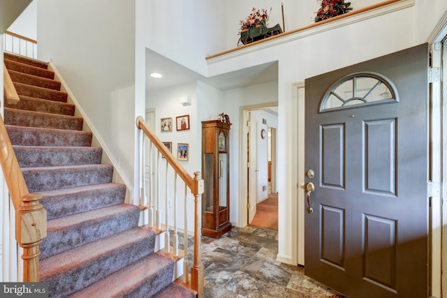 137 S Ronks Rd, Ronks, PA 17572 - foyer entrance with a high ceiling, stairs, and baseboards