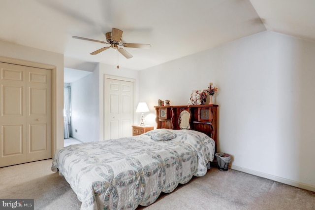 137 S Ronks Rd, Ronks, PA 17572 - carpeted bedroom featuring lofted ceiling, ceiling fan, baseboards, and two closets