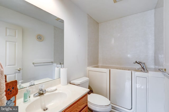 137 S Ronks Rd, Ronks, PA 17572 - bathroom featuring toilet, vanity, and a garden tub