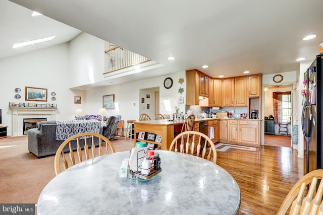 137 S Ronks Rd, Ronks, PA 17572 - dining area with recessed lighting, a glass covered fireplace, and light wood-style flooring