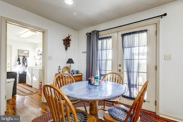 137 S Ronks Rd, Ronks, PA 17572 - dining space featuring washer / clothes dryer, wood finished floors, and french doors