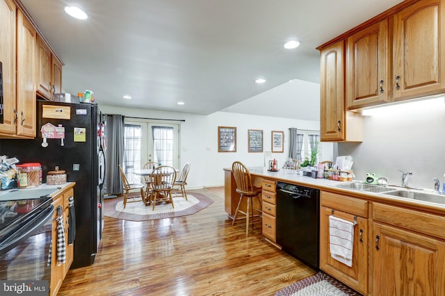 137 S Ronks Rd, Ronks, PA 17572 - kitchen with black appliances, a sink, light wood-type flooring, recessed lighting, and light countertops
