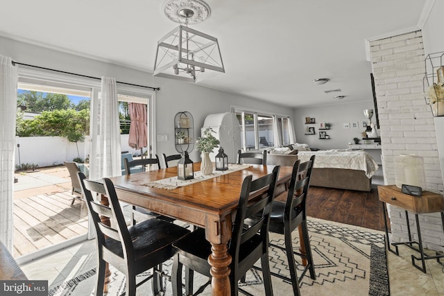 dining space with a chandelier