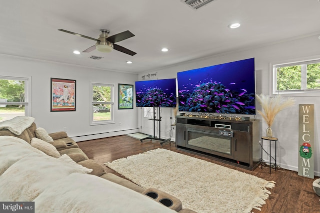 living area featuring ceiling fan, crown molding, recessed lighting, a baseboard radiator, and wood finished floors