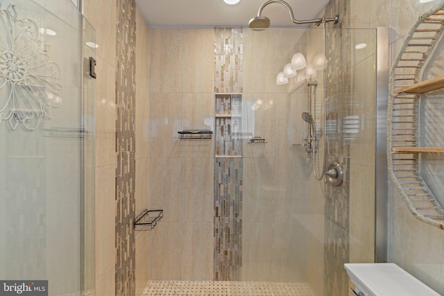 full bathroom featuring a shower stall