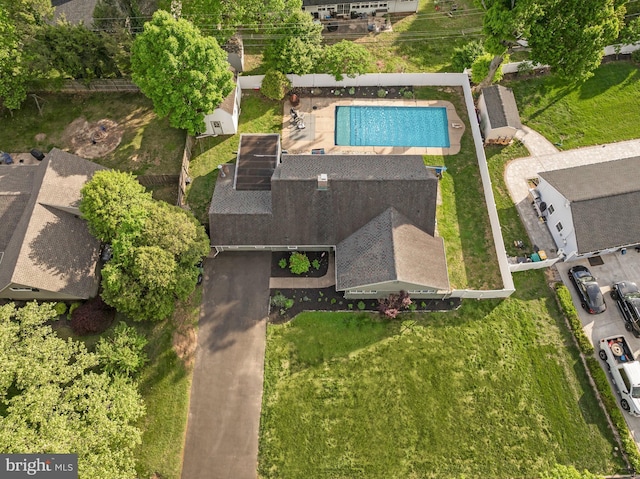 view of property location with a pool