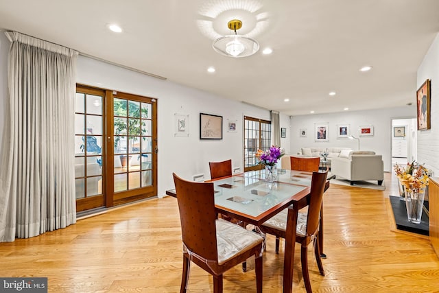 dining area featuring recessed lighting and light wood-type flooring