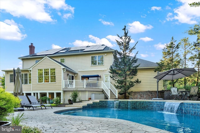 102 Windsong Dr, Doylestown, PA 18901 - outdoor pool with stairway, a wooden deck, and a patio