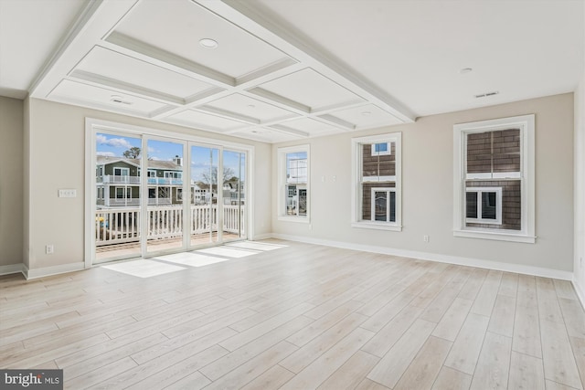 57 Bayside Dr, Fenwick Island, DE 19944 - unfurnished sunroom with healthy amount of natural light, beamed ceiling, and coffered ceiling
