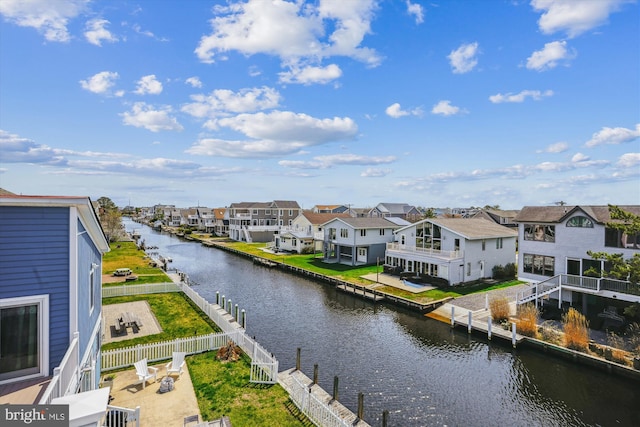 57 Bayside Dr, Fenwick Island, DE 19944 - water view with nearby suburban area and a fenced backyard